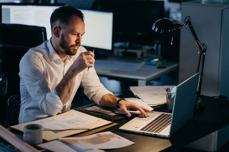 Mature-Male-Careerist-Working-At-Night